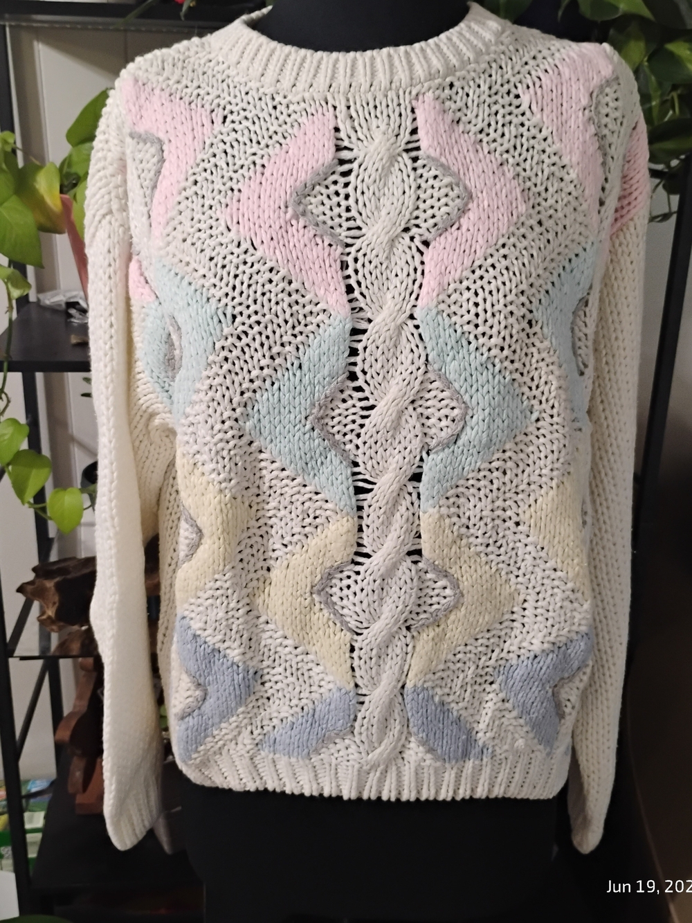 Cream Cable-Knit Sweater with Pastel Chevron Accents